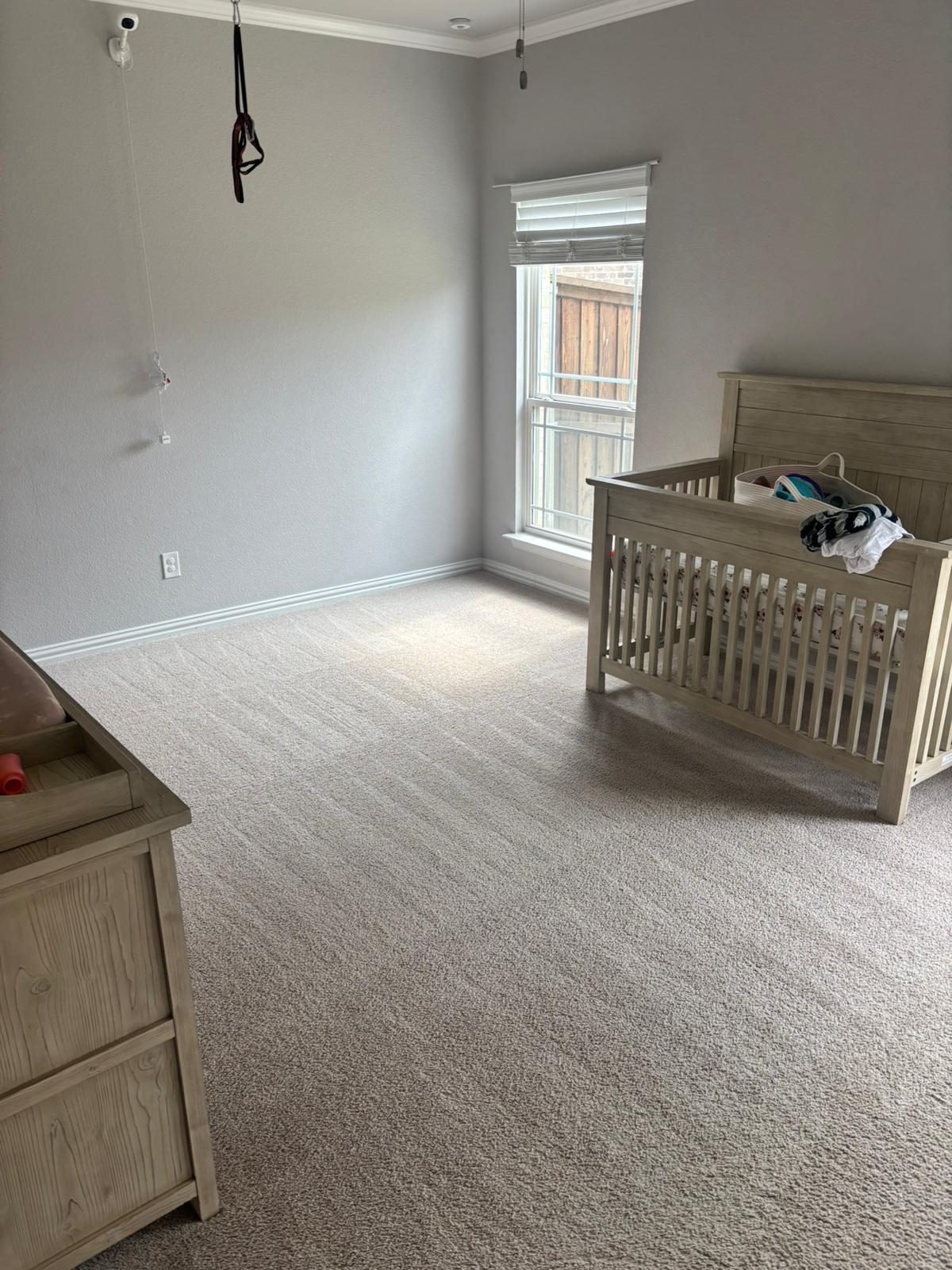 Freshly cleaned bedroom carpet in a North Texas home — Squeaky Clean residential carpet cleaning